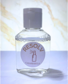 Imagem de frasco transparente contendo Vanish Resolv, com rótulo personalizado de CASAMARELA.